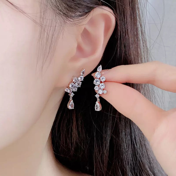 Tear drop clustered earrings